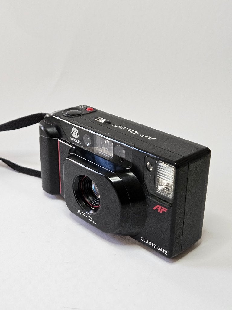 Minolta AF-DL Quartz Date - Flitser werkt niet, Audio, Tv en Foto, Ophalen of Verzenden, Gebruikt, Compact, Minolta
