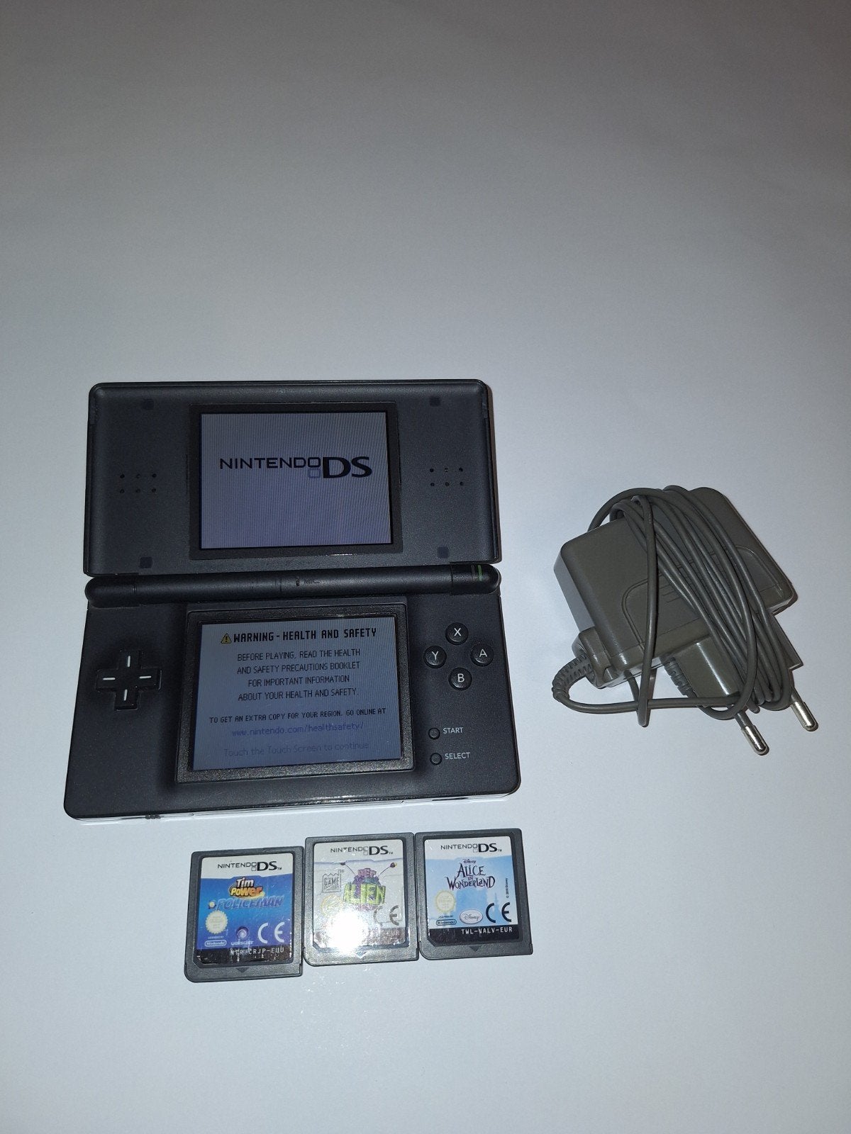 Zwarte Nintendo DS Lite in mooie staat mt 3 games en oplader, Ophalen of Verzenden