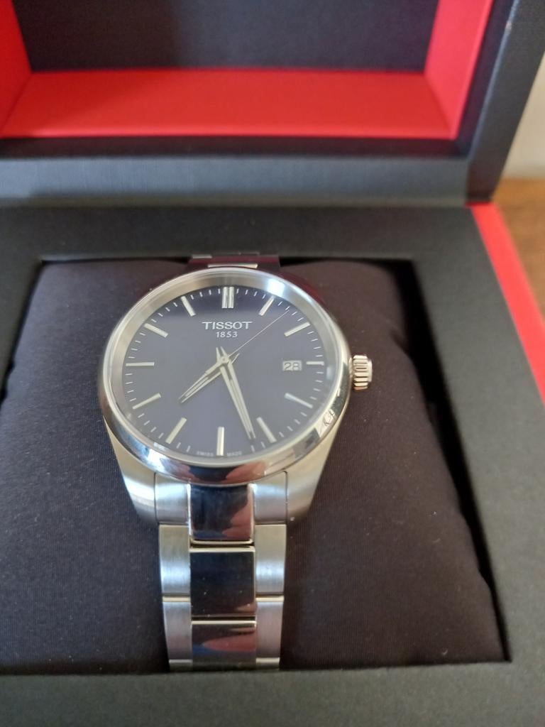 Horloge heren merk Tissot, Ophalen