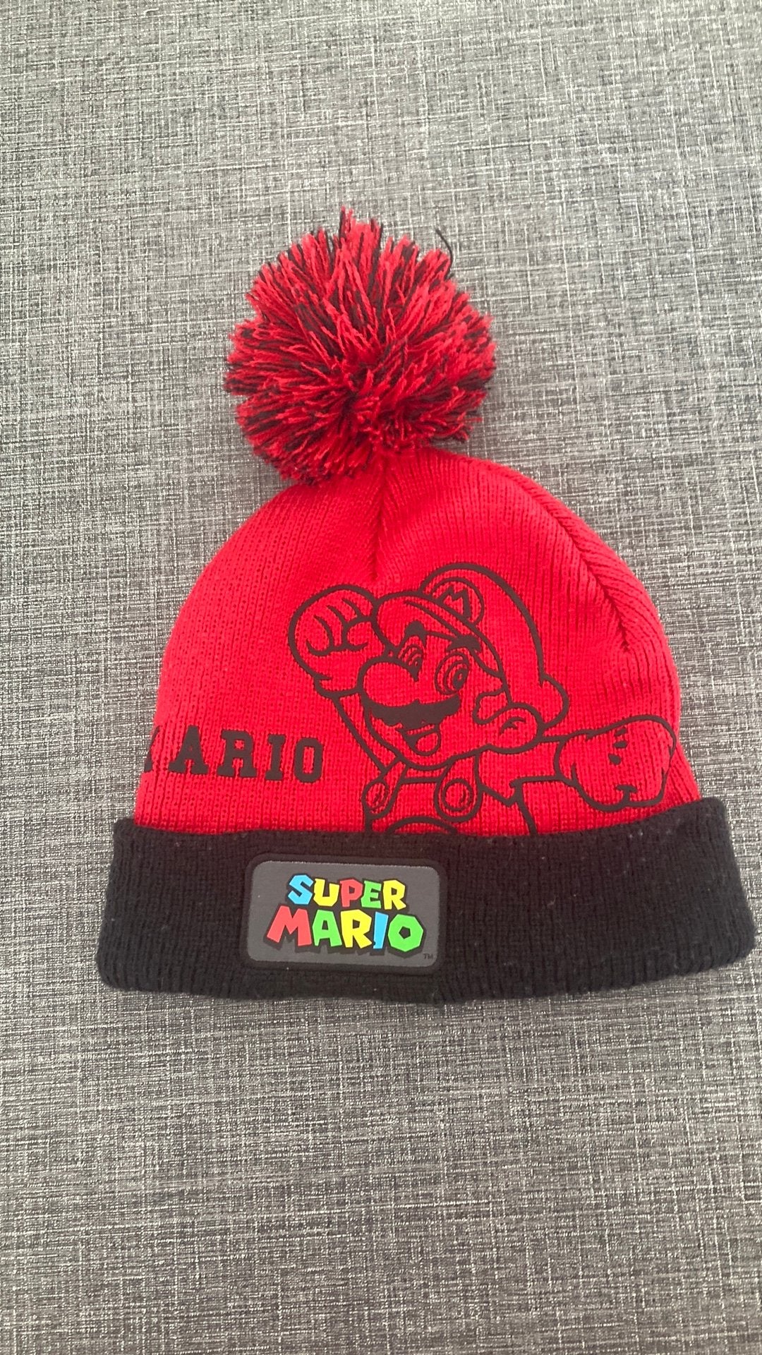Super mario kindermuts, Kinderen en Baby's, Kinderkleding | Mutsen, Sjaals en Handschoenen, Ophalen of Verzenden, Zo goed als nieuw