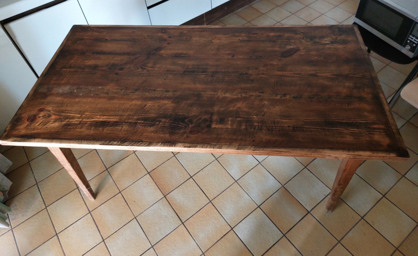 Table de cuisine massive, Enlèvement