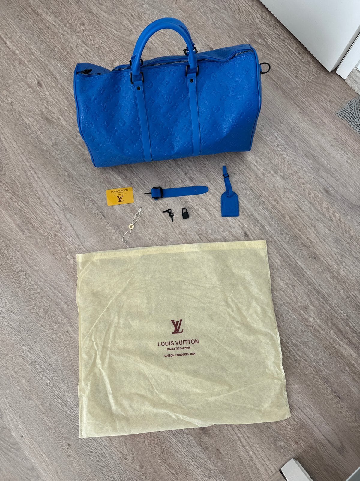 Sac de voyage Louis Vuitton, Envoi, Comme neuf, Rouge