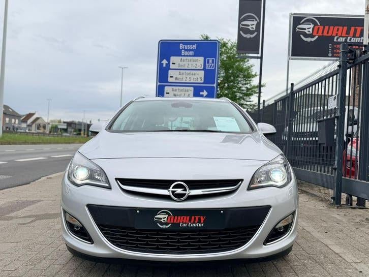 Opel Astra Sports Tourer 2016 125dkm 1.4i Euro6b Xenon Leder, Autos, Opel, Cuir, Argent ou Gris, Euro 6, Entreprise