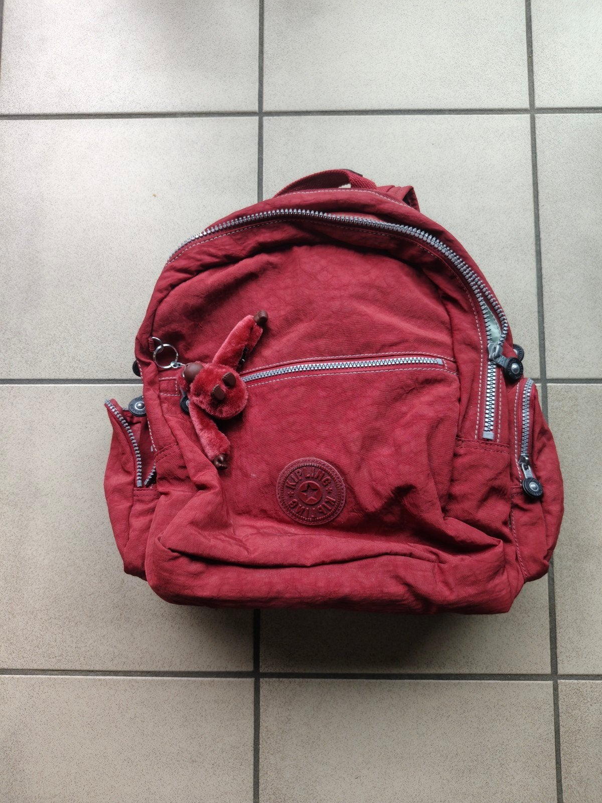Sac à dos Kipling bordeaux - grand format - état neuf, Handtassen en Accessoires, Ophalen, 30 tot 40 cm, Rugtas, Rood