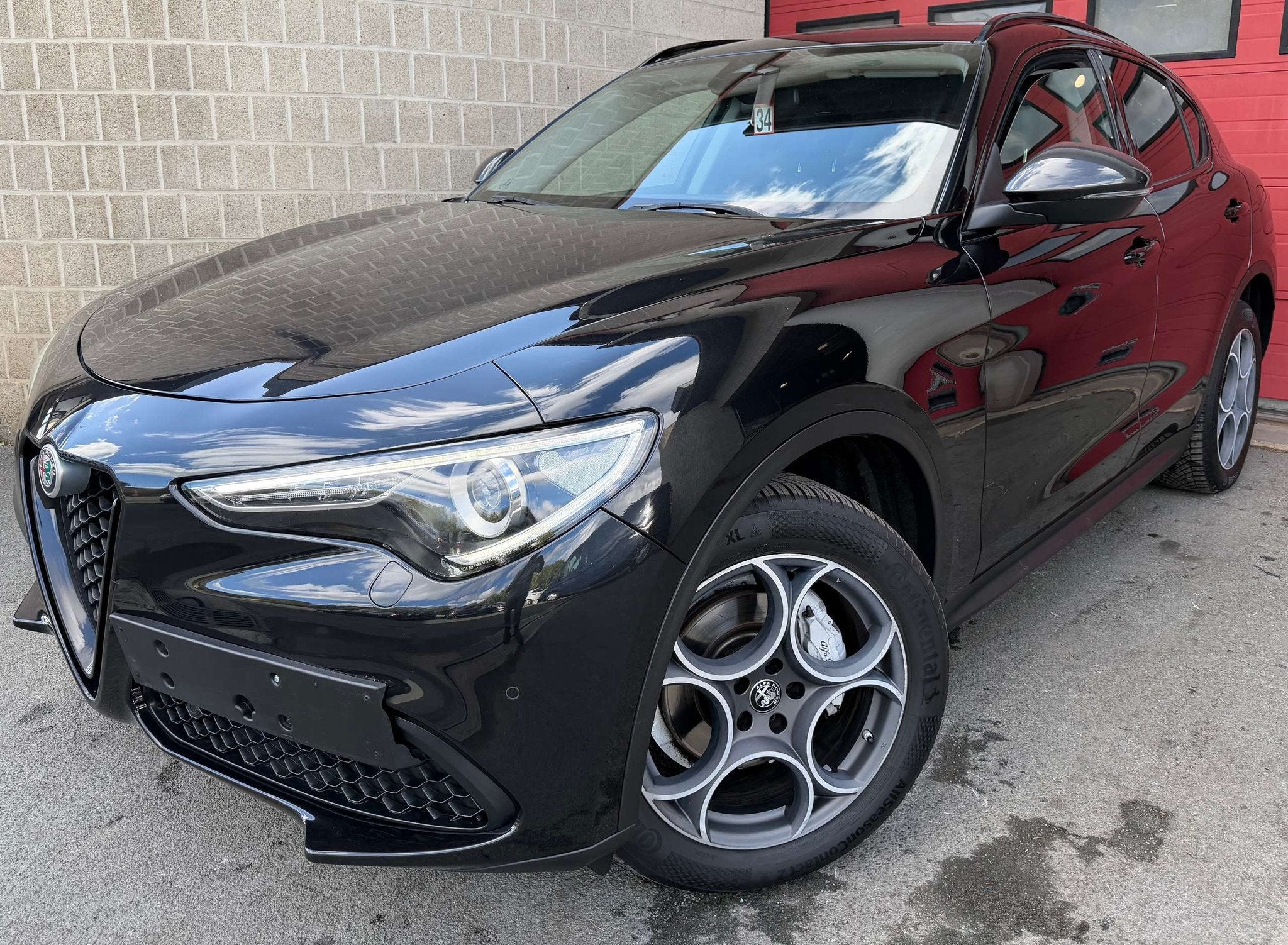 Alfa Romeo Stelvio 2.0 T AWD Sport + CAMÉRA + NAVI + CUIR, Automaat, 4 cilinders, Zwart, Leder