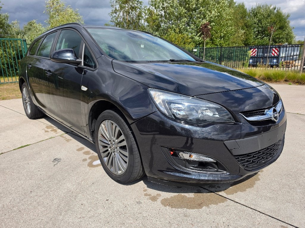 Opel Astra Sports Tourer 1.4i Airco Gekeurd + Garantie, Auto's, Euro 5, Zwart, 5 deurs, Dealer onderhouden