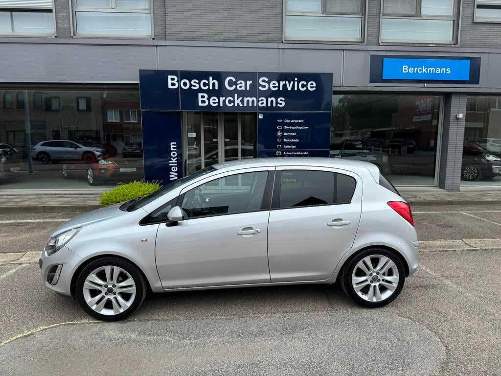 Opel Corsa Cosmo 5D 1.2 benzine met garantie, Autos, Entreprise, 5 portes, Capteur de lumière, 5 places