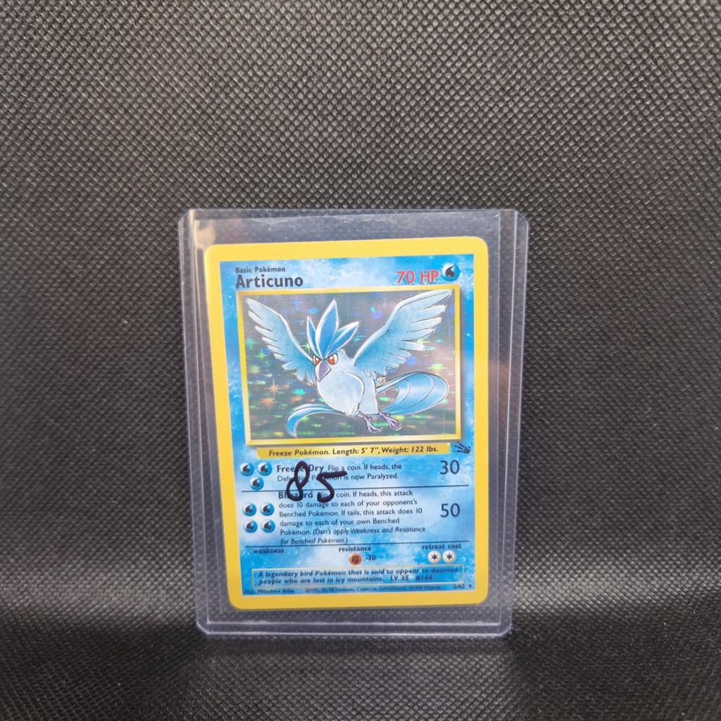 Articuno Holo Fossil NM, Hobby en Vrije tijd, Verzamelkaartspellen | Pokémon, Ophalen of Verzenden