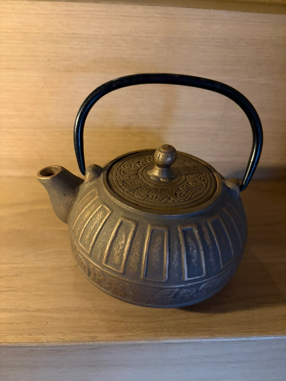 Oud Japans theepot in gietijzer, Ophalen