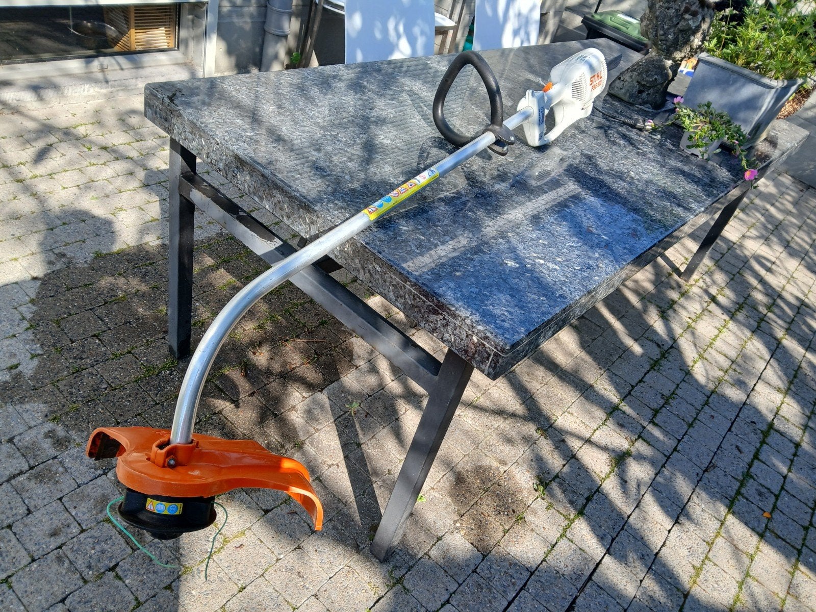 Stihl graskantmaaier, Ophalen