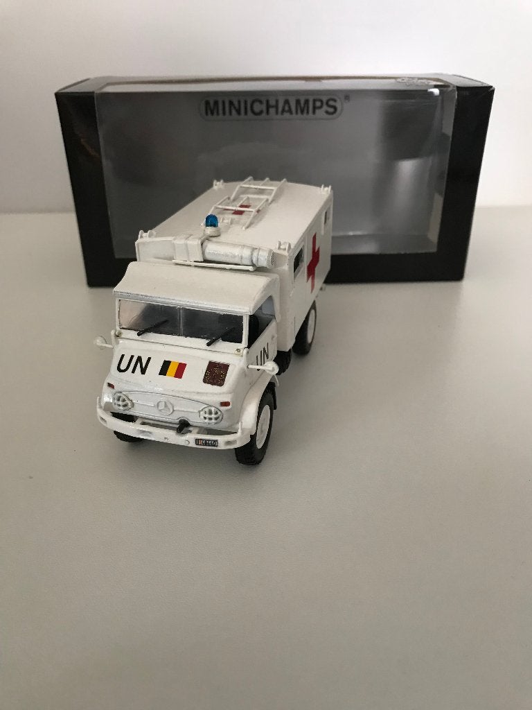 UNIMOG AMBULANCE ARMÉE BELGE / UNITED NATIONS - 1:43, Envoi, Neuf, Bus ou Camion, MiniChamps