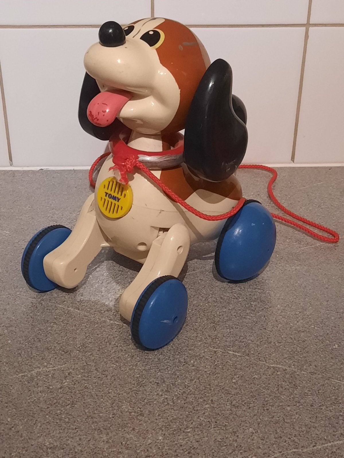 vintage trekhondje tomy, Ophalen