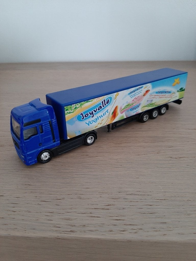 man truck met oplegger, Ophalen