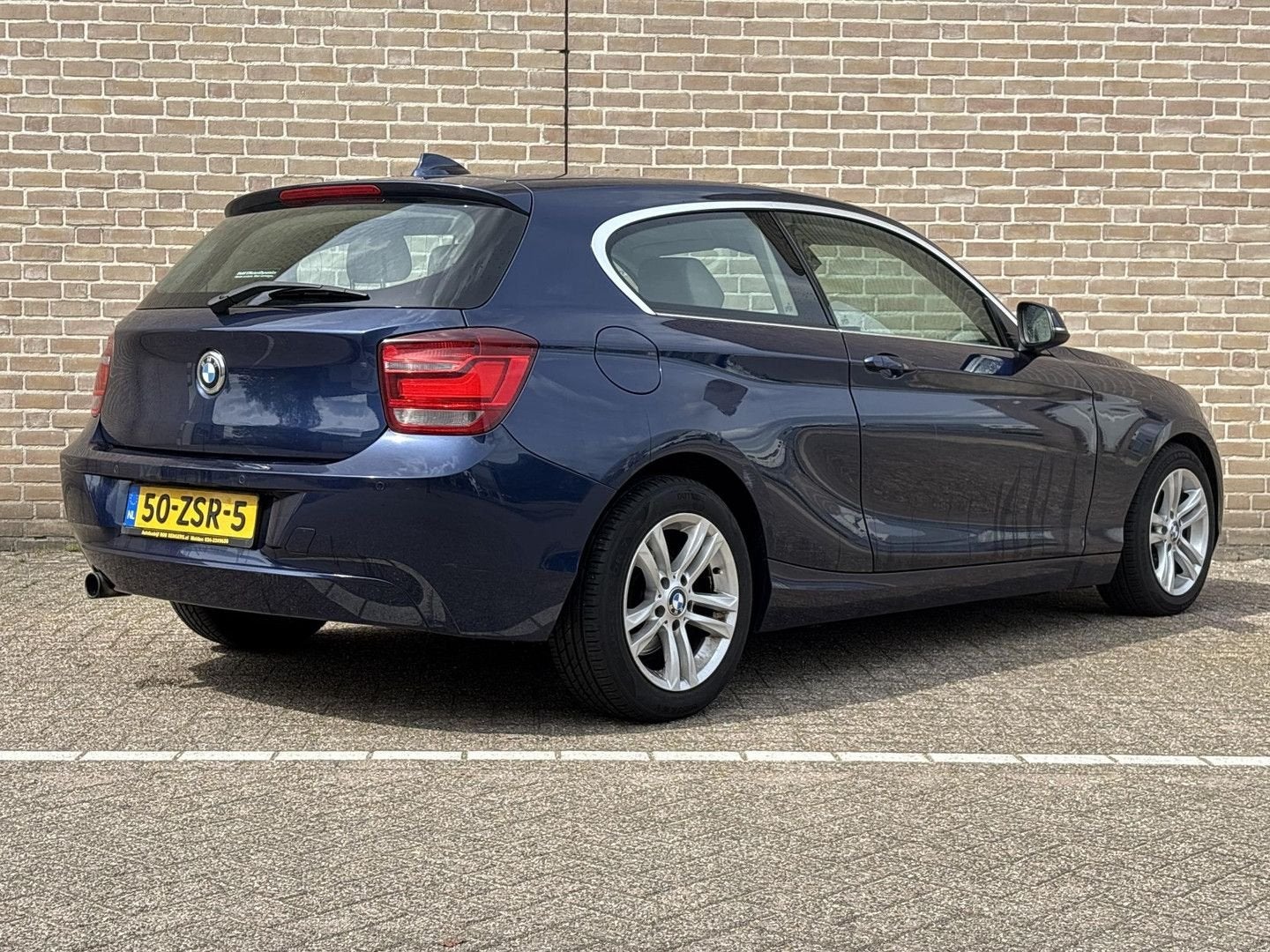 BMW 114 1-serie 114i EDE Business+ | Leder | Climate | Navi, Autos, BMW, Achat, Entreprise, Boîte manuelle, 124 g/km