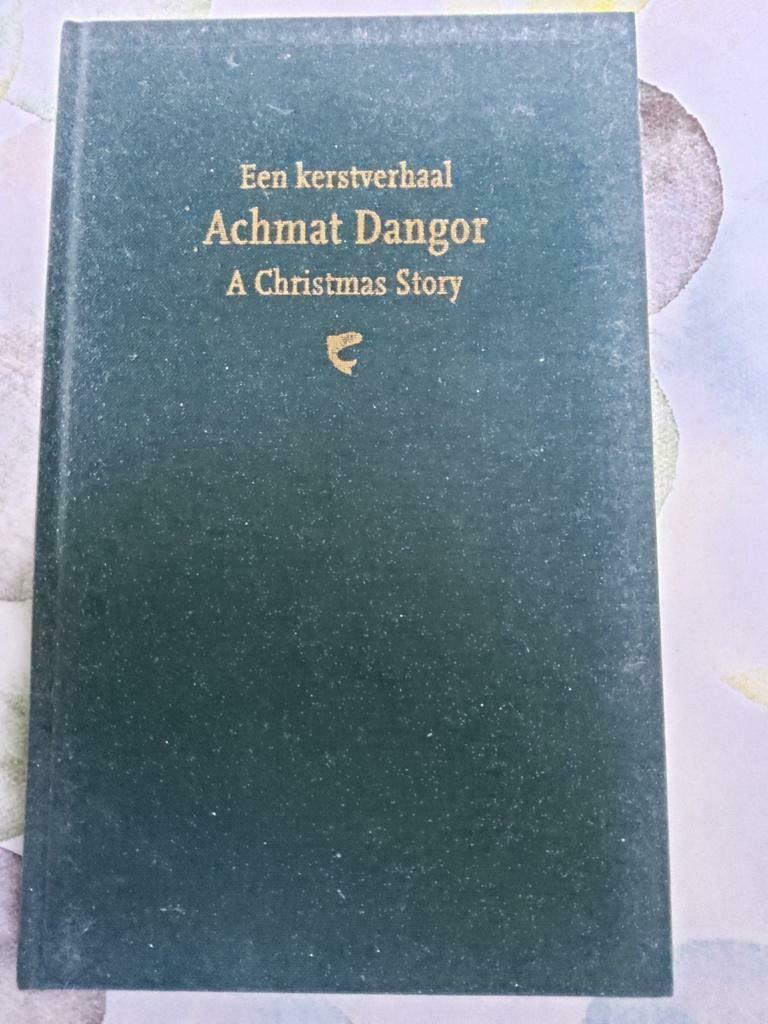 Één kerstverhaal - Achmat DANGOR. GRATIS, Enlèvement ou Envoi, Utilisé