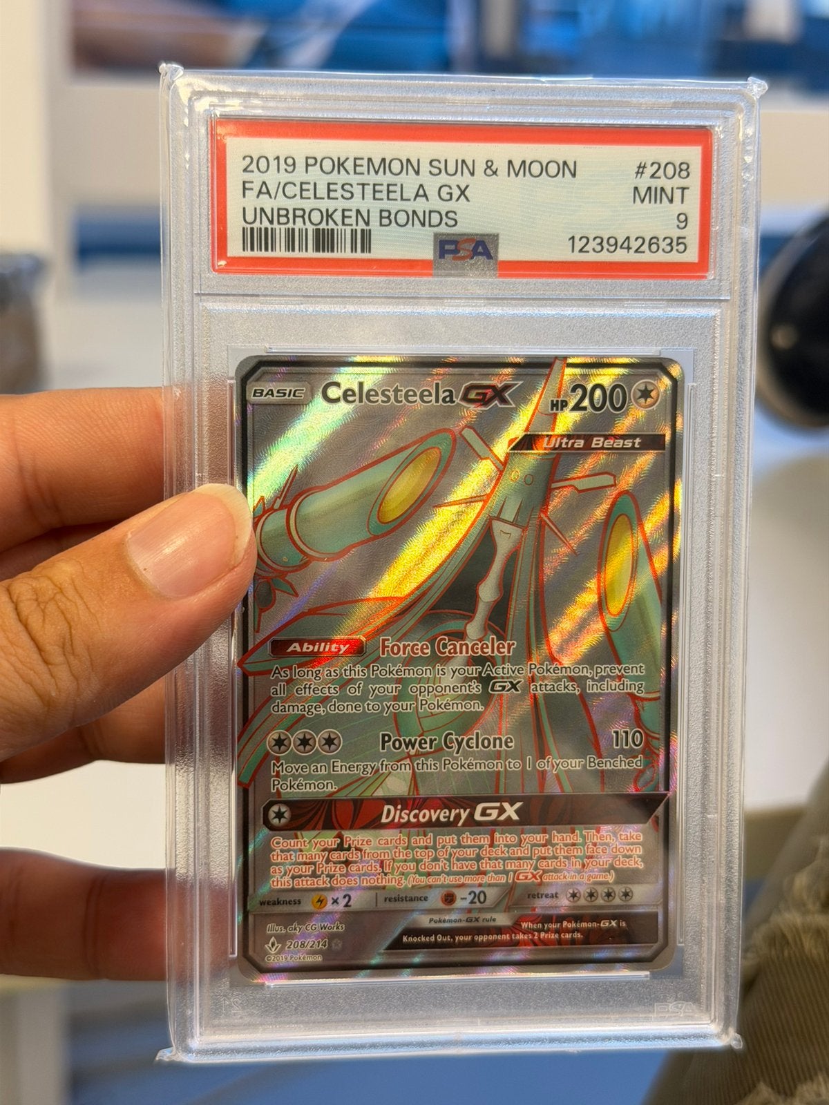 Pokémon Celesteela GX 208/214 Unbroken Bonds PSA 9 - 2019, Ophalen of Verzenden, Zo goed als nieuw, Losse kaart, Foil