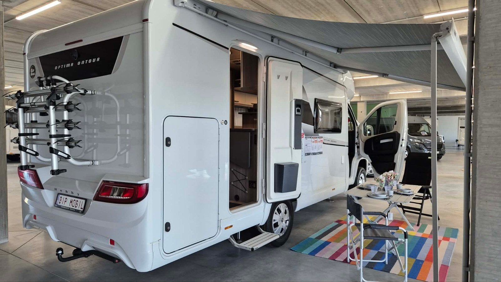 Camper/Mobilhome Hobby Optima Ontour T65 HKM all inclusive, Caravans en Kamperen, Mobilhomes, Ringverwarming, Hobby, Tot en met 6