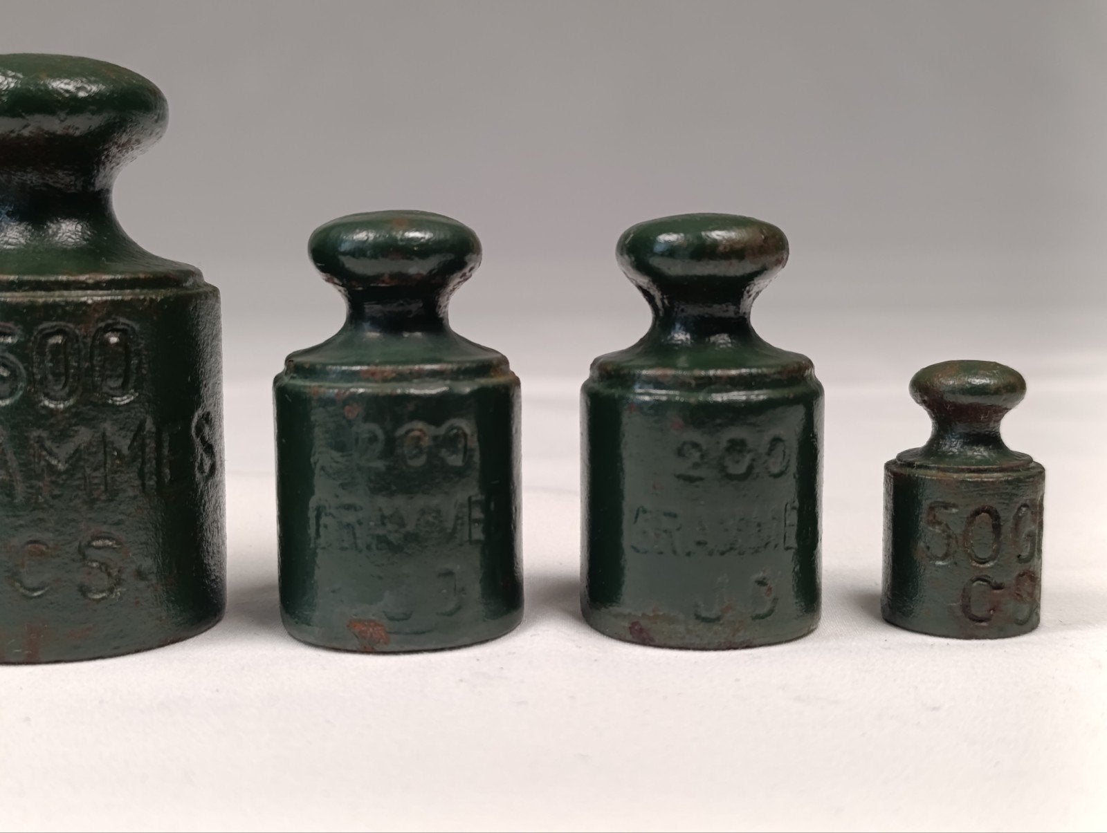 Antieke gietijzeren knopgewichten set (5 stuks), Ophalen of Verzenden