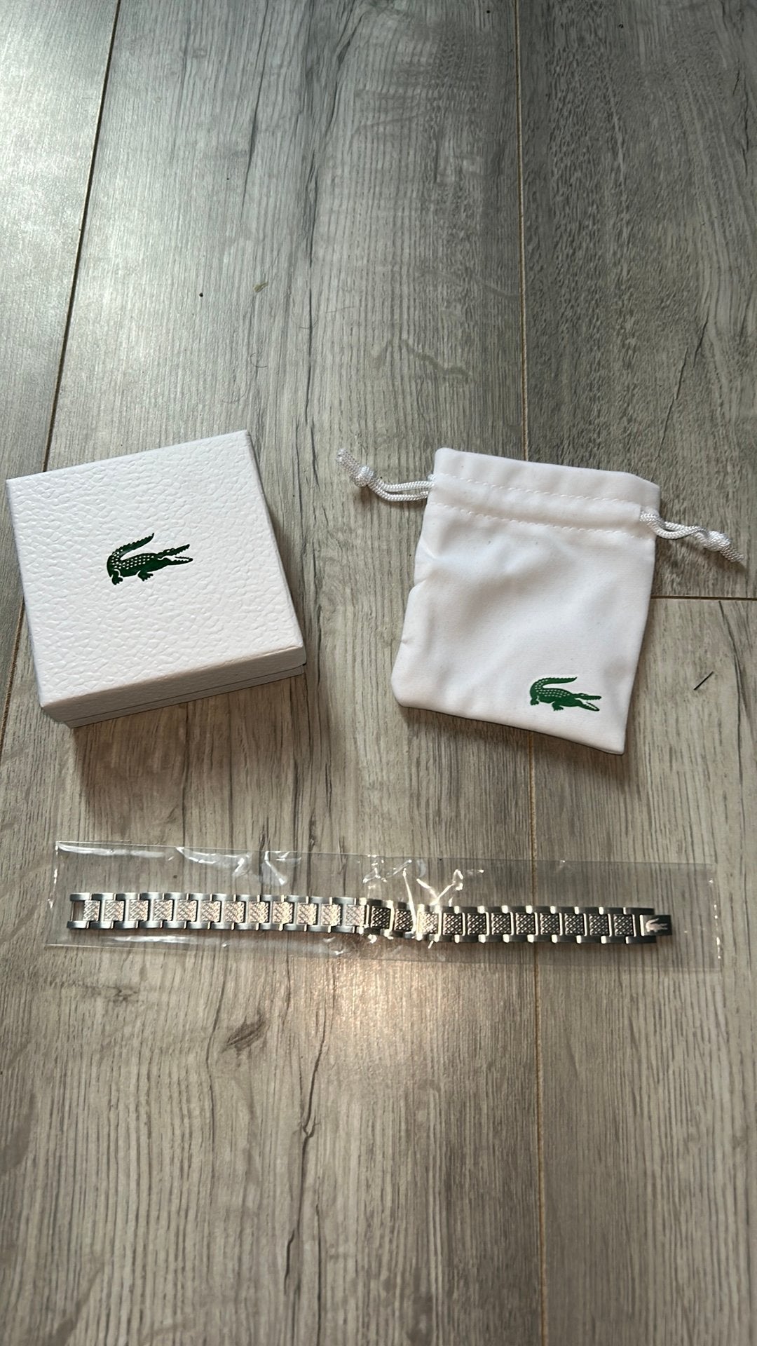 Bracelet lacoste neuf, Handtassen en Accessoires, Ophalen, Nieuw, Staal
