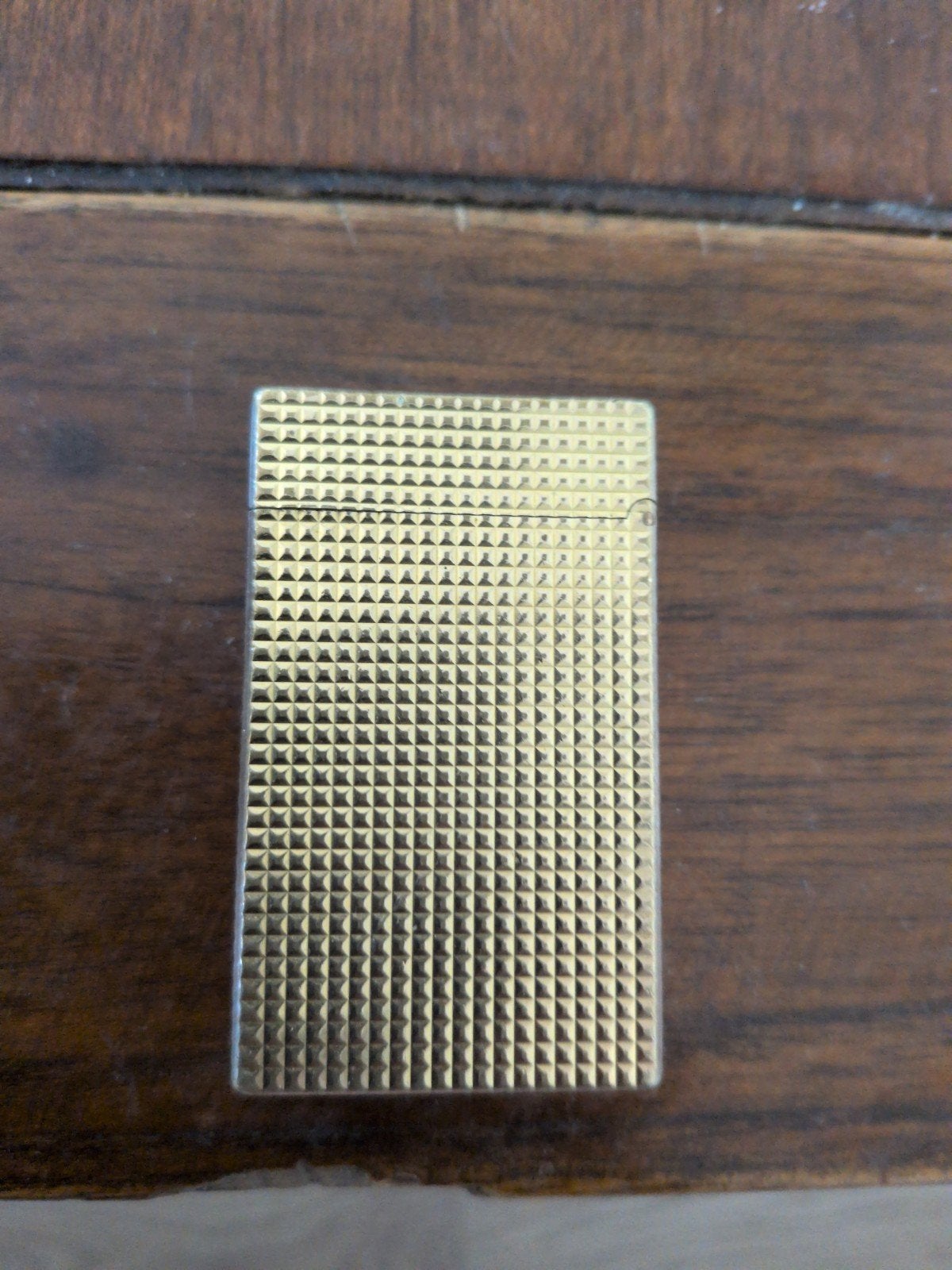 Briquet Dupont, Ophalen, Goud