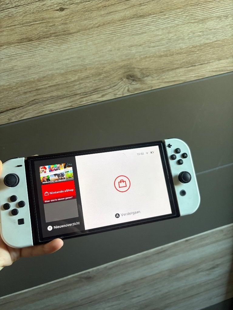 Nintendo, Games en Spelcomputers, Switch OLED, Met 2 controllers, Ophalen of Verzenden, Gebruikt