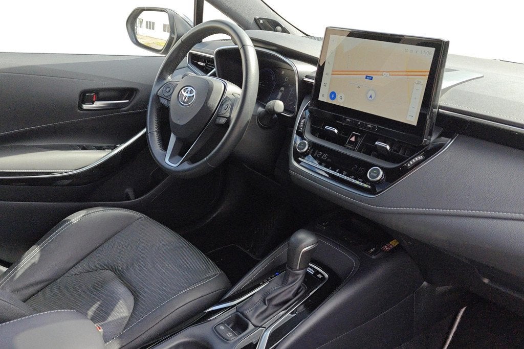 Toyota Corolla TS 1.8 Hybrid Premium e-CVT incl Winterset +, Auto's, Toyota, Gebruikt, 4 cilinders, Automatische klimaatregeling