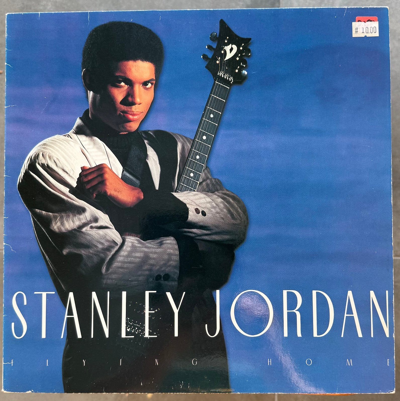 LP Stanley Jordan - Flying home, CD & DVD, Vinyles | Jazz & Blues, Enlèvement ou Envoi, Utilisé, Jazz fusion, LP