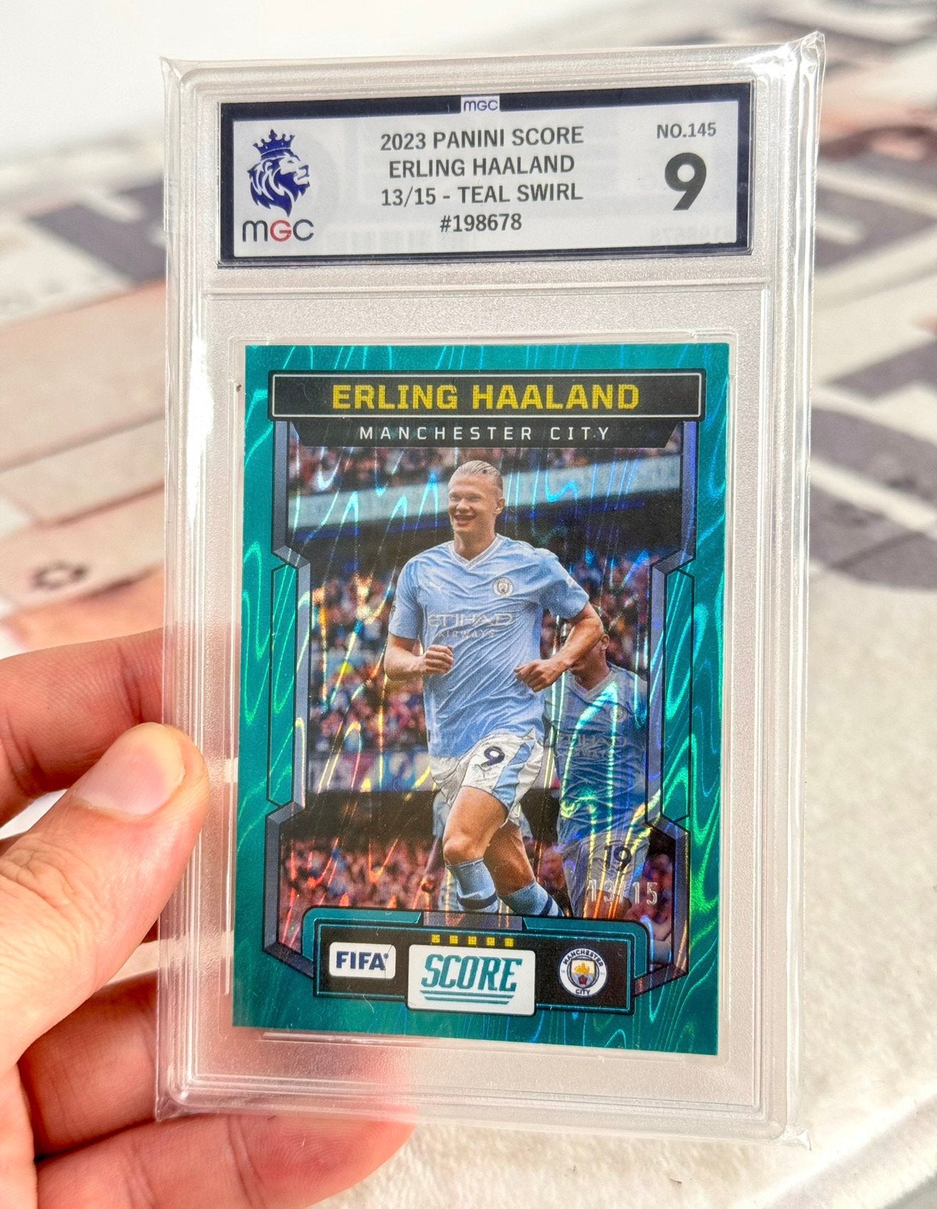 2023-2024 Panini Fifa score Erling Haaland /15 teal swirl 9, Ophalen of Verzenden, Nieuw, Spelerskaart