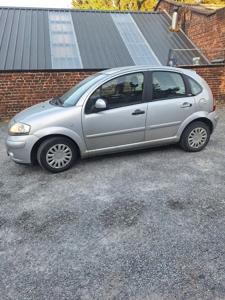 Citroën c3 essence 1.1 de 2010 roule très bien 124.000km, Autos, 1124 cm³, Argent ou Gris, Achat, Boîte manuelle