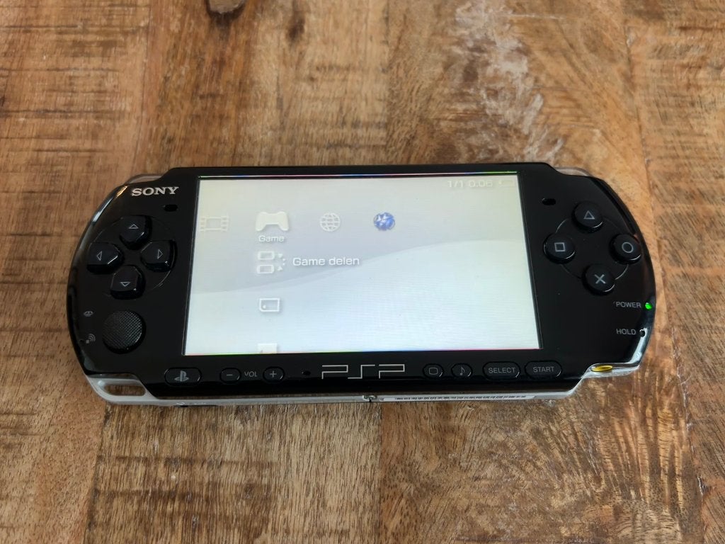 Sony PSP 3000 Piano Black, Consoles de jeu & Jeux vidéo, Consoles de jeu | Sony PSP, Utilisé, PSP, Noir, Avec jeux, Avec films UMD