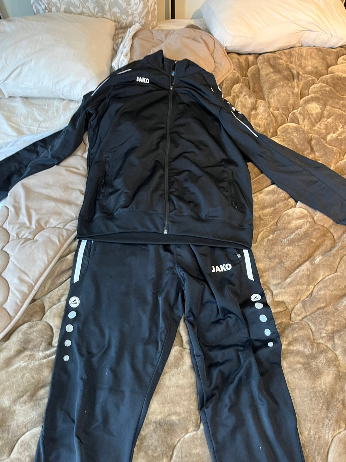 Trainingspak van jako, Kleding | Heren, Sportkleding, Ophalen, Zo goed als nieuw, Maat 56/58 (XL), Zwart