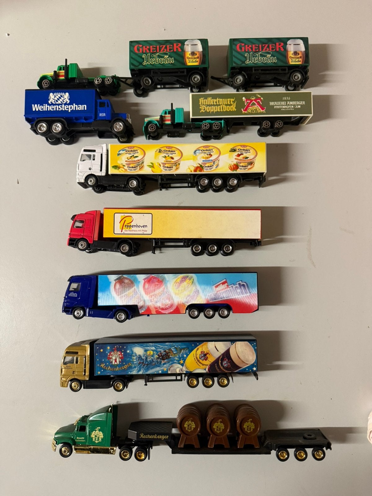 Lot van 8 miniatuurvrachtwagens met Duitse bier- en reclame, Ophalen of Verzenden, Zo goed als nieuw, Bus of Vrachtwagen, Overige merken