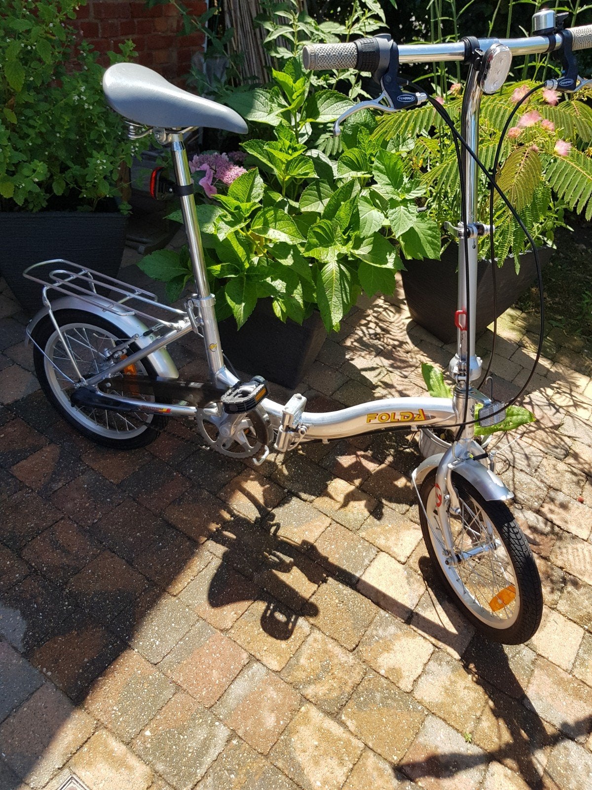 Vouwfiets plooifiets, Ophalen