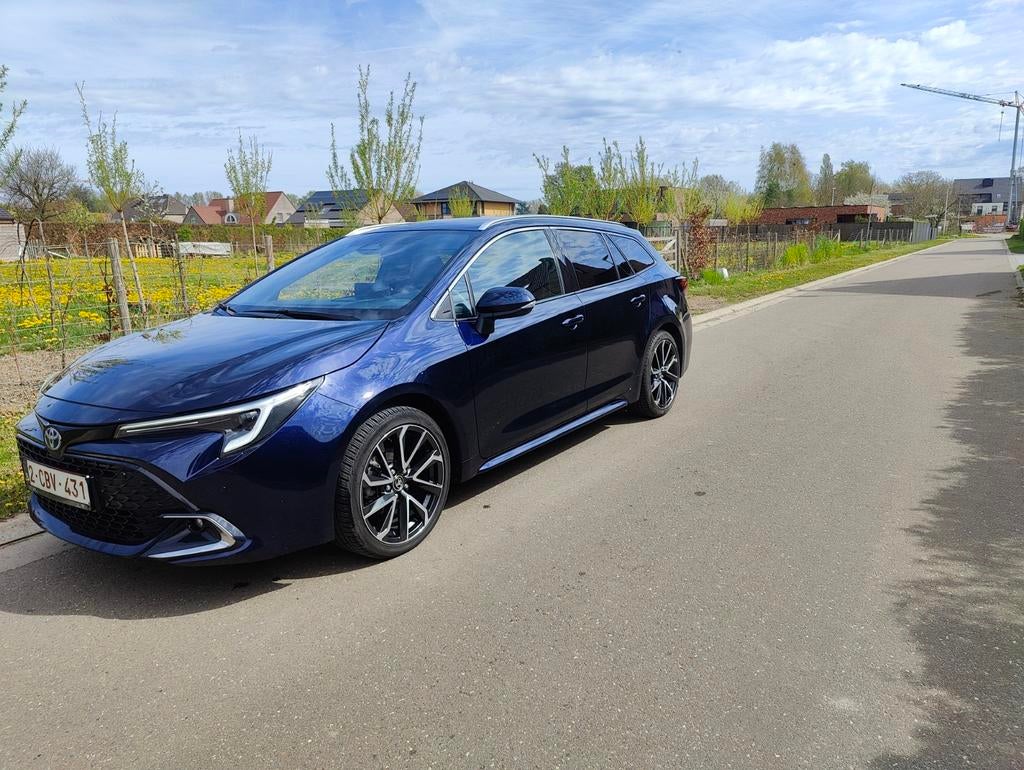 Toyota Corolla hybride 1.8i 01/24 25000km 10jaar garantie, Auto's, Blauw, 5 deurs, Te koop, Voorwielaandrijving