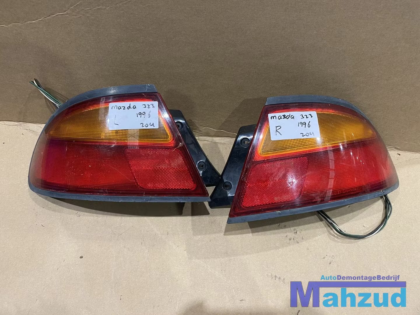 MAZDA 323 F 5 Achterlicht rechts links 1994-1998, Gebruikt, Shinchi, Fuchu-Cho 3-1
730-8670  Hiroshima, Mazda Motor Corporation