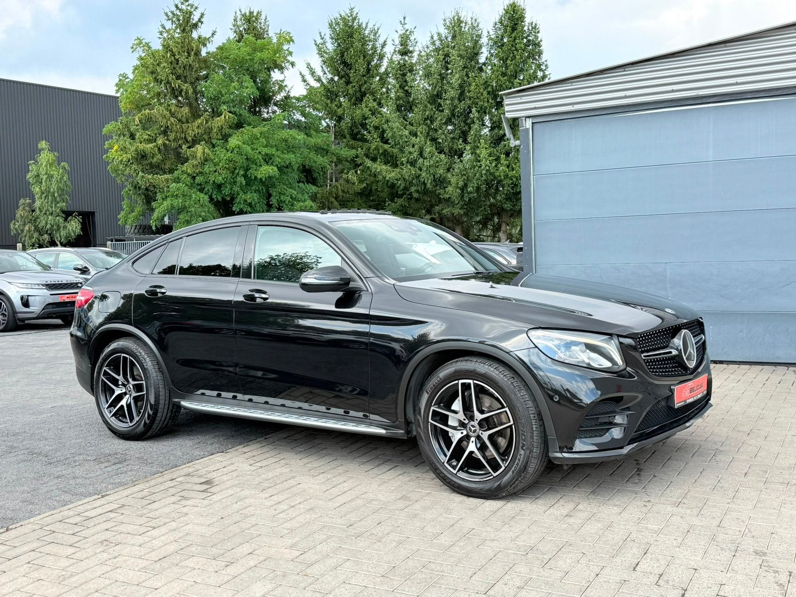 Mercedes-Benz GLC 250 4MATIC Coupe Amg Line 1jaar garantie, Auto's, Euro 6, Alcantara, Zwart, Vierwielaandrijving