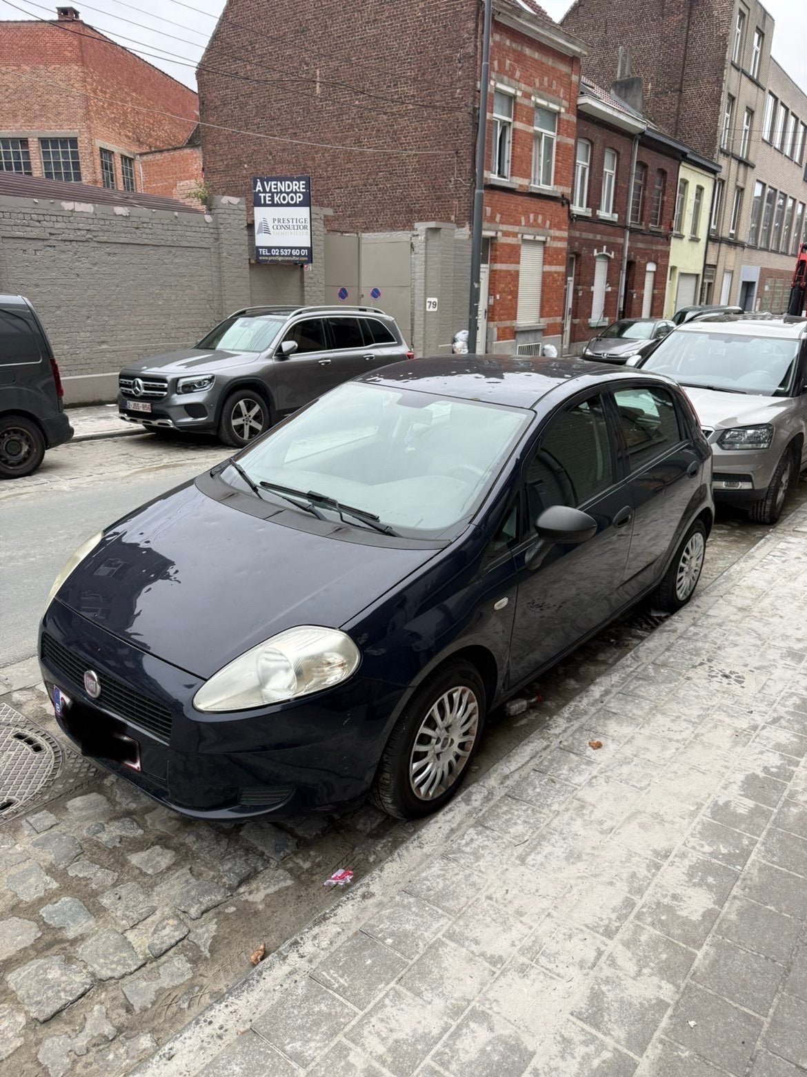 Fiat punto 1.2 benzine - 2012, Auto's, Fiat, Multifunctioneel stuurwiel, Euro 5, Zwart, Blauw