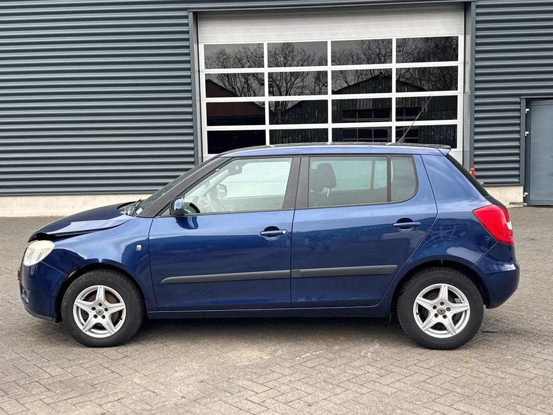 Skoda Fabia 1.2-12V Tour, airco, cruise control, Voorwielaandrijving, Blauw, 1198 cc, 1010 kg