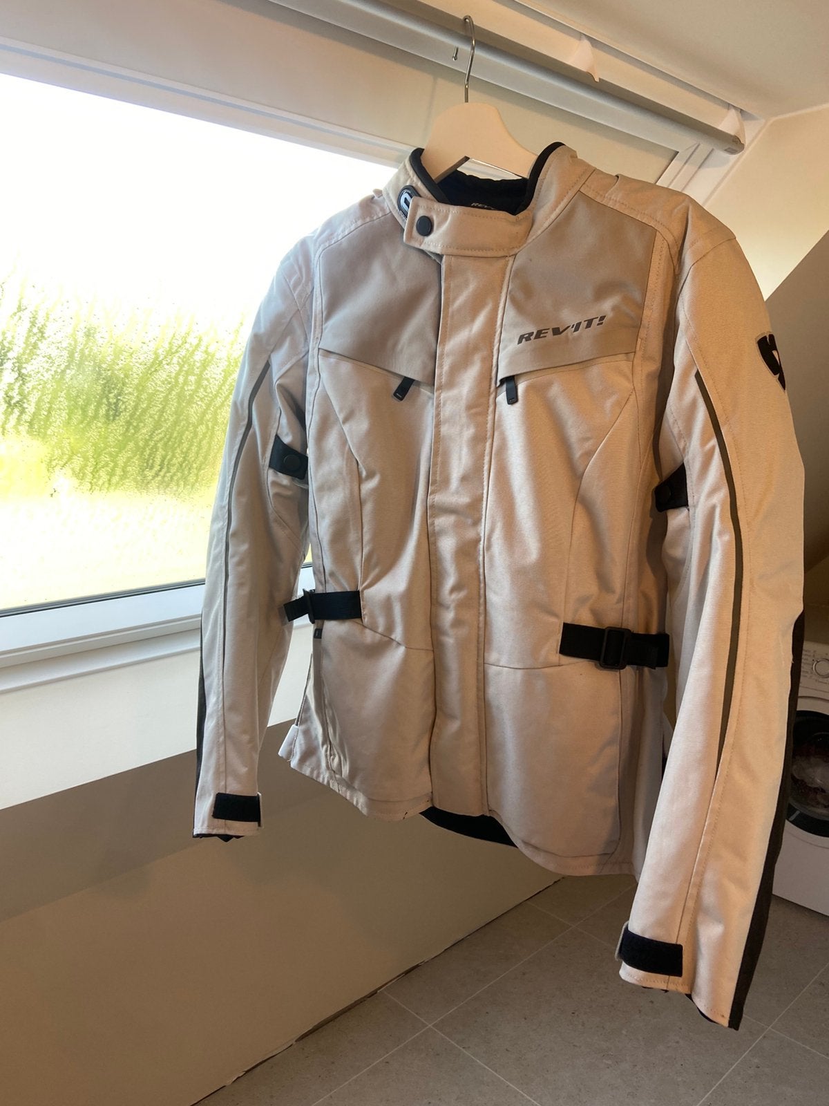 Rev’it motorjas dames incl rugbeschermer, Enlèvement, Comme neuf, Taille 42/44 (L), Argenté