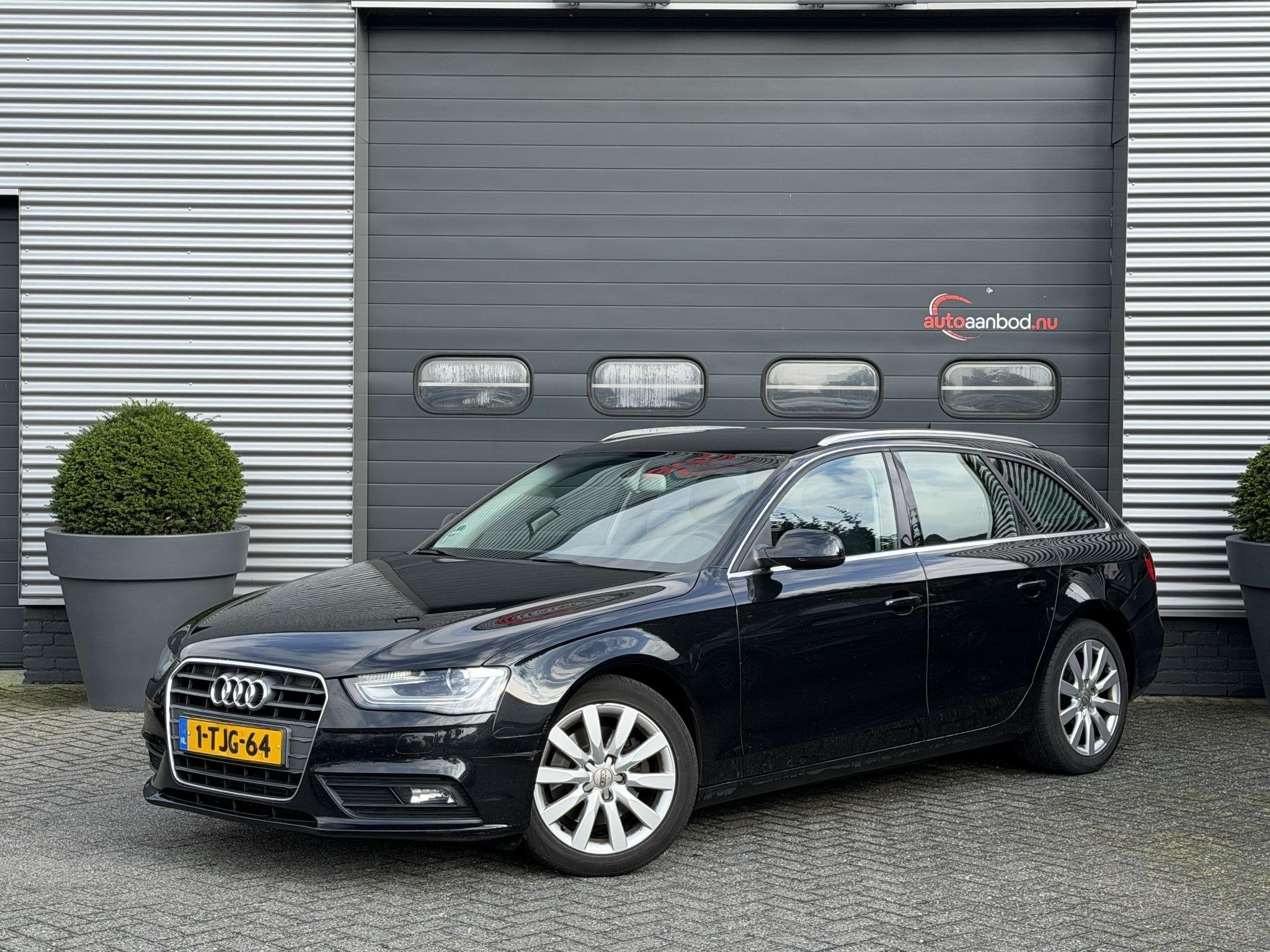 Audi A4 Avant 1.8 TFSI Business Edition | Navigatie | Parkee, Auto's, Euro 5, Stof, Zwart, 4 cilinders