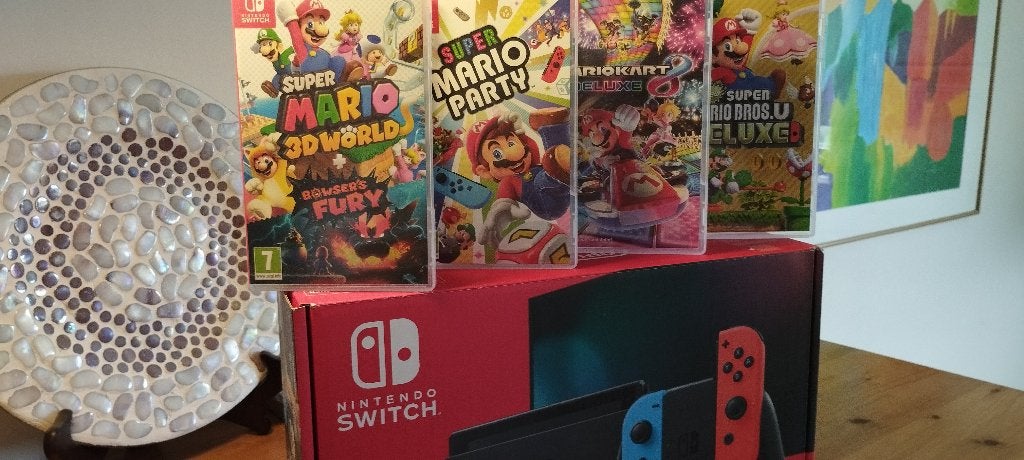nette,complete nintendo switch met mario spellen, Met games, Met 2 controllers, Ophalen of Verzenden, Zo goed als nieuw