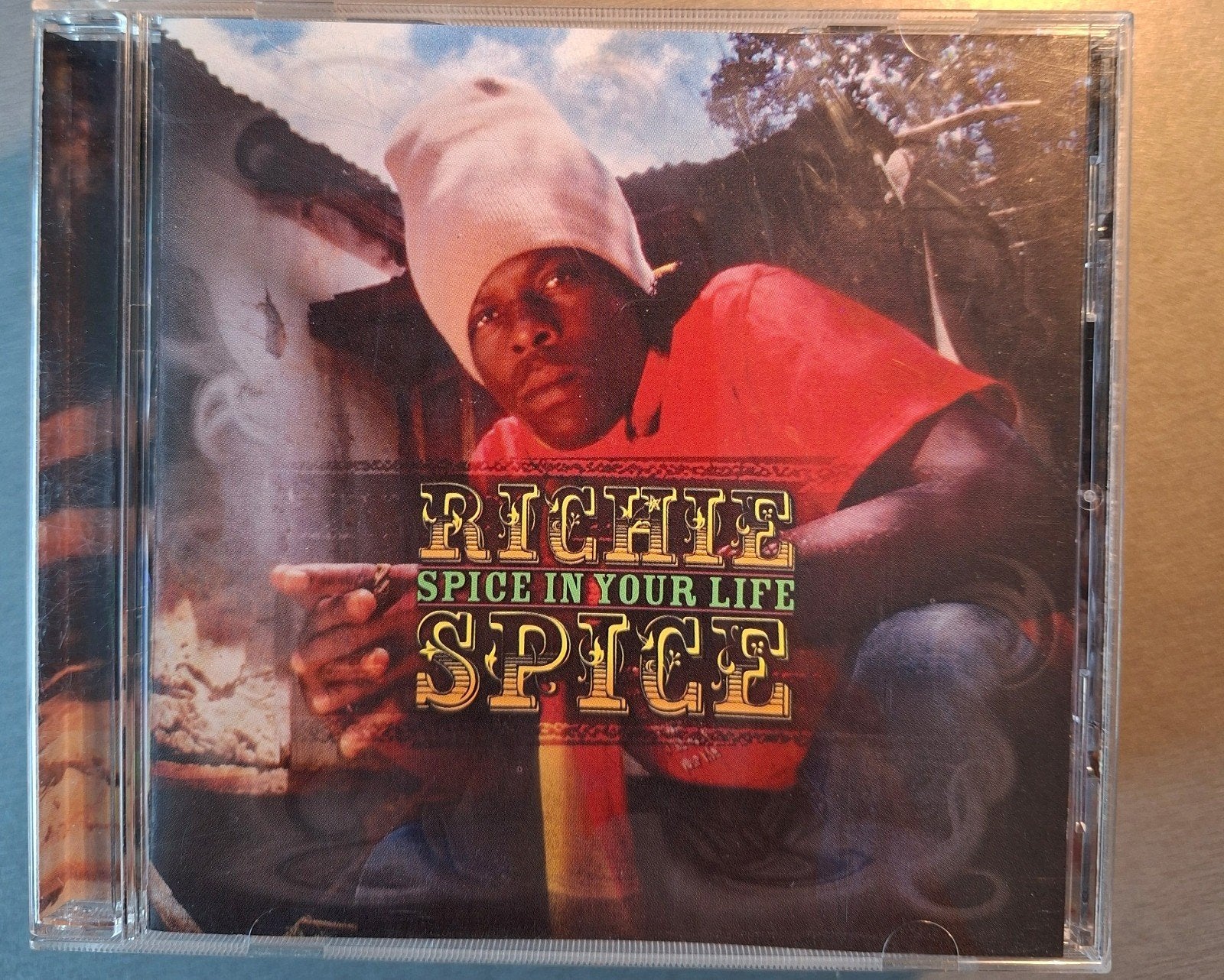CD. Richie Spice. Ajoutez du piquant à votre vie., CD & DVD, CD | Reggae & Ska, Enlèvement ou Envoi
