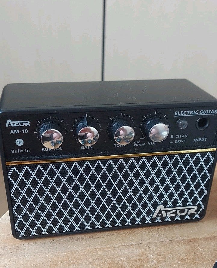 pocked gitaar versterker, Ophalen, Gitaar