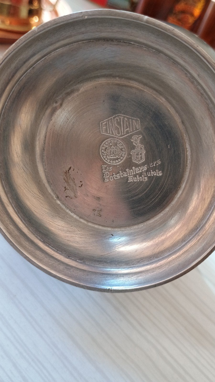tinnen kannetje, Ophalen