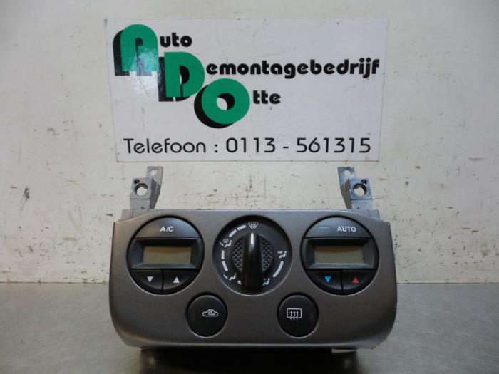 Panneau de commandes chauffage d'un Nissan Primera (Primera, -, 3 mois de garantie, Utilisé, -