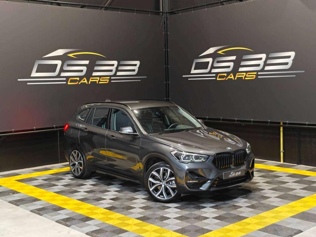 BMW X1 2.0iAS SPORT 192pk/LED/Keyless/19"/Leder/Ambi/PDC, Auto's, 1998 cc, Gebruikt, Zwart, Bedrijf