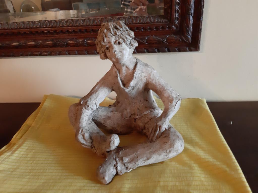 Statuette en terre cuite, Enlèvement