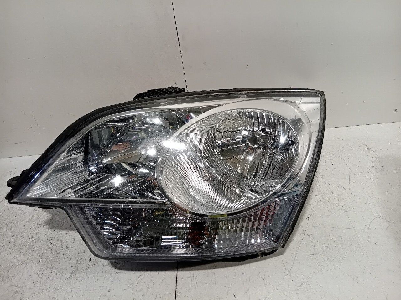 Koplamp links Opel Antara, Auto-onderdelen, Verlichting, Onderdelen@venauto.nl, Van der Ven Autorecycling B.V., Gebruikt, Ettenseweg 76, 4706 PB Roosendaal, The Netherlands