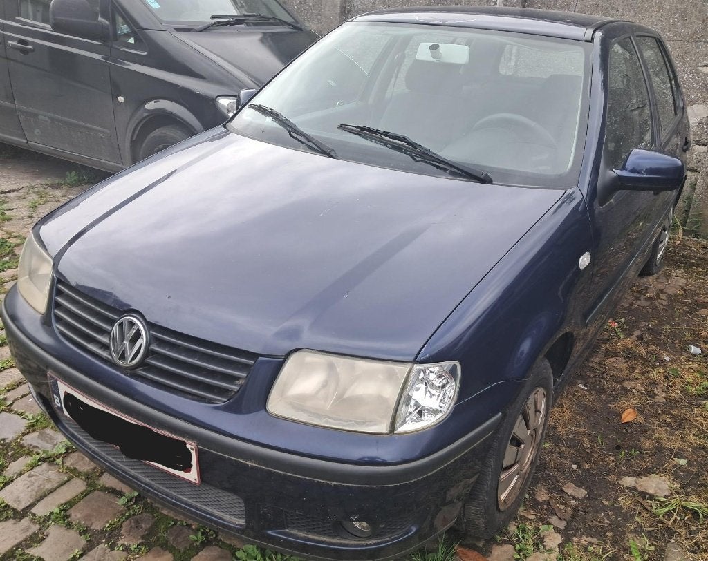VW polo 1.4 benzine MPI automaat export, Auto's, Stof, 50 kW, 4 cilinders, Blauw