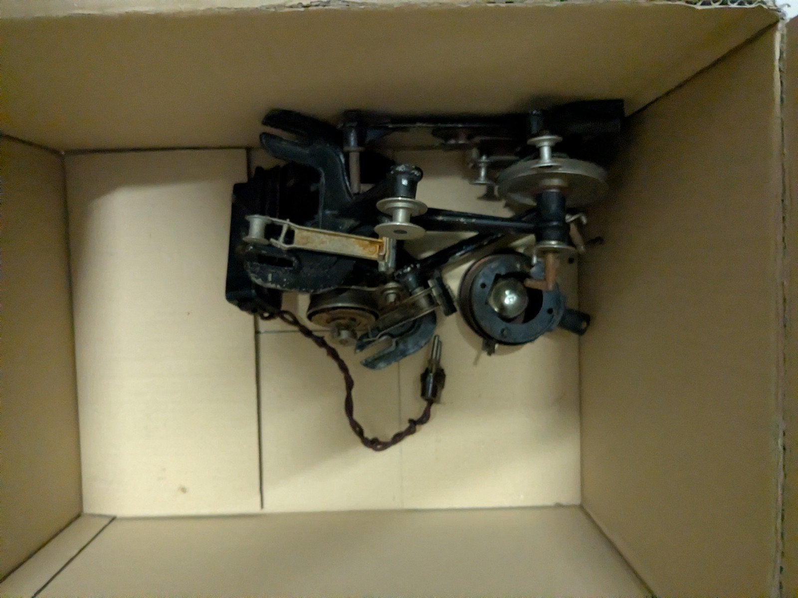 Filmprojector, camera en kleine rolletjes film, Ophalen